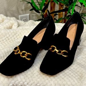 Black suede dress shoes that can be worn all day.